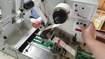 Labelling of golden zip lock pouches with round labels - LAB510