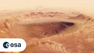 Fly around Neukum crater with Mars Express (ESA archive - May 2018)
This movie, based on images taken by ESA’s Mars Express, showcases the 102 km wide Neukum Crater in the southern hemisphere of Mars.
The crater is named for the German physicist and planetary scientist, Gerhard Neukum, one of the founders of ESA’s Mars Express mission who inspired and led the development of the high-resolution stereo camera on Mars Express.
This complex impact crater has a diverse geologic history, as indicated by various features on the crater rim and floor. Particularly striking are the dark dune fields, likely made up of volcanic material blown in and shaped by strong winds.
The crater’s shallow interior has been infilled by sediments over its history. It is also marked with two irregular depressions that may be a sign of a weaker material that has since eroded away, leaving behind some islands of more resistant material.
Over time the crater rim has undergone varying degrees of collapse, with landslides and slumped material visible in the crater walls. Many smaller craters have also overprinted the rim and pockmarked the interior since Neukum Crater was formed, highlighting its long history.
Neukum Crater is situated in Noachis Terra, one of the oldest known regions on Mars, dating back to at least 3.9 billion years.
More information and images: http://www.esa.int/Our_Activities/Space_Science/Mars_Express/Crater_Neukum_named_after_Mars_Express_founder
Credits: Animation: ESA/DLR/FU Berlin, CC BY-SA 3.0 IGO; Music: Coldnoise, CC BY-SA 4.0 and Adrian Neesemann
Access the video on the ESA video library: https://www.esa.int/ESA_Multimedia/Videos/2018/05/Flight_over_Neukum_crater
Our main YouTube channel: https://www.youtube.com/@EuropeanSpaceAgency
We are Europes gateway to space. Our mission is to shape the development of Europes space capability and ensure that investment in space continues to deliver benefits to the citizens of Europe and the world. Check out https://www.esa.int/ to get up to speed on everything space related.
Copyright information about our videos is available here: https://www.esa.int/ESA_Multimedia/Terms_and_Conditions Fly around Neukum crater with Mars Express (ESA archive - May 2018)
