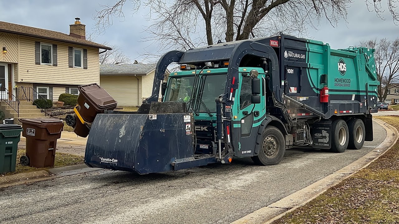 Homewood's New Mack CNrG Heil LowRider Curotto Can Flying Through a Trash Route