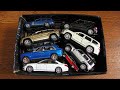 Large and small toy cars in the box