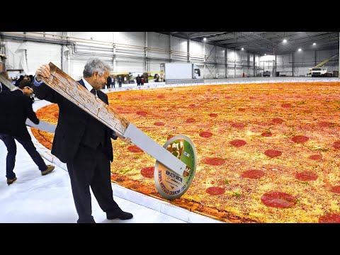 DUVIDO NÃO SE IMPRESSIONAR COM A MAIOR PIZZA DO MUNDO DE VERDADE!!