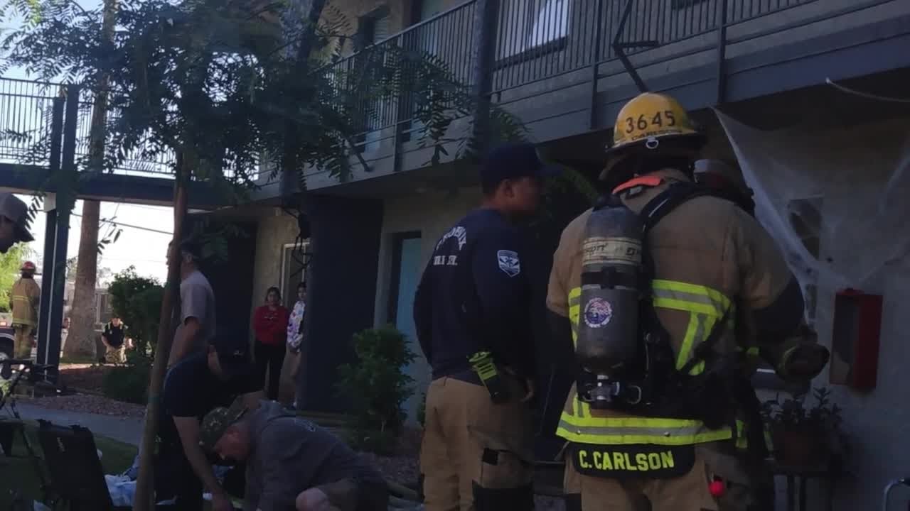 Valley man rescues man and cat from burning apartment - YouTube