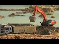 Extreme Excavator Heavy Equipment Operator Skill Digging Loading Dump Trucks. Hitachi 350h Excavator