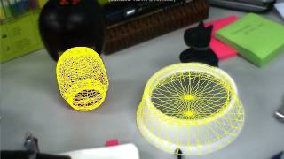 Camera Tracking Using Partially Modeled 3-D Objects with Scene Textures (ISVRI'11)