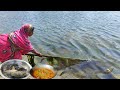 Amazing catching fish with hand in river big fish catchingsin village by riverfish catching