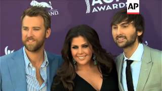 Country stars shine on the ACM Awards red carpet