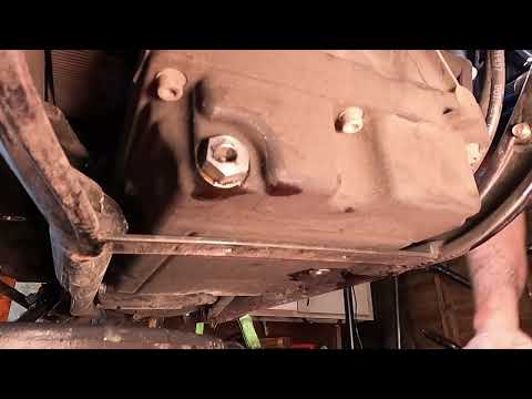 Transmission oil change on M8 Harley