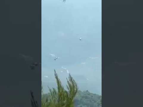 Two firefighting helicopters collide battling wildfires near Athens