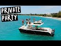 PRIVATE BIRTHDAY PARTY ON DOUBLE DECKER BOAT IN TURQUOISE WATERS OF TURKS AND CAICOS