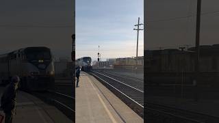 UP Grain Train Meets Amtrak Capitol Corridor At Roseville Station