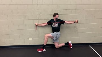Band Wall 1/2 Kneeling T Spine Rotation