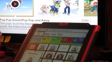 Jenny communicating with her Dynavox 2015