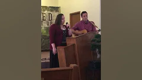 Sister and brother singing together