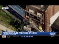 Person rescued by firefighters from top of building in Pittsburgh's Greenfield