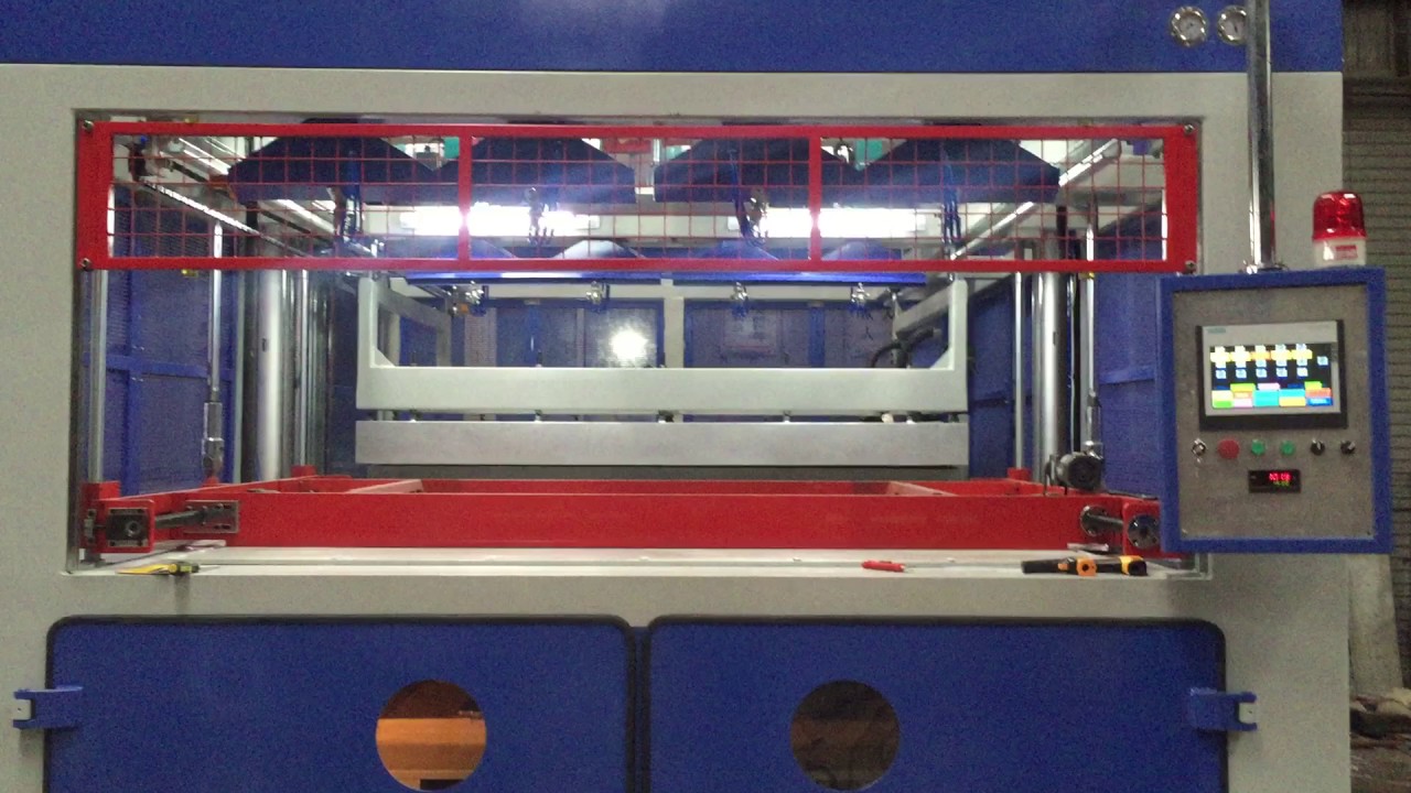 XSH2015 thick sheet vacuum forming machine 1 - YouTube