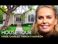 Charlize Theron | House Tour | $2 Million Hollywood Hills Mansion & More