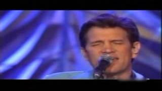 Video thumbnail of "Chris Isaak performing Solitary Man on Soundstage"