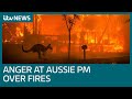 Australian PM heckled as he visits fire-ravaged town | ITV News