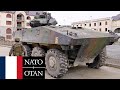 French army, NATO. Armored vehicles and soldiers during large-scale military exercises.