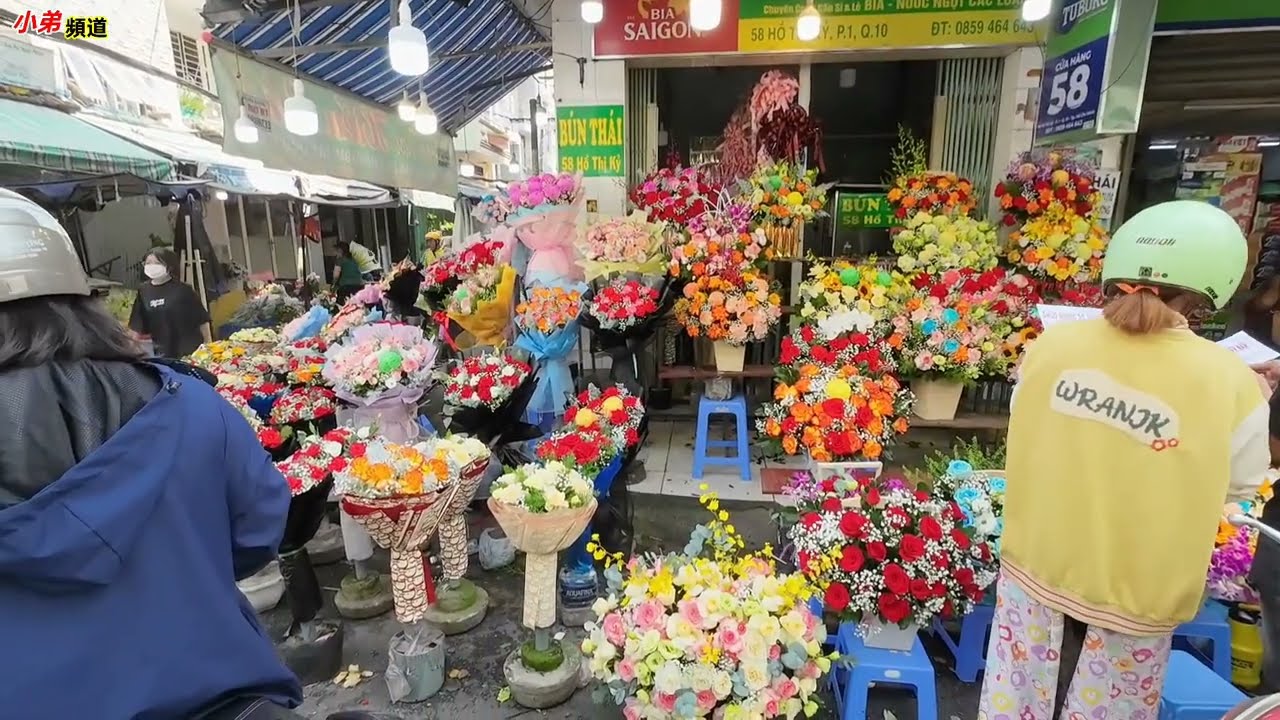 越南婦女節 街市花胡氏紀第十郡  。越南胡志明市。粤語 HOCHIMINH SAIGON DẠO PHỐ NGÀY PHỤ NỮ VIỆT NAM CHỢ HOA HỒ THỊ KỶ