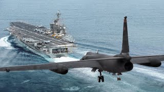 Gigantic US Spy Plane Lands on a US Aircraft Carrier