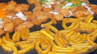 A LOT OF PASTA AND DOUGH FRIED WITH EGGS STREET FOOD MUST TRY AT HO CHI MINH CITY