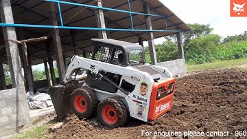 Bobcat with Bucket Attachment