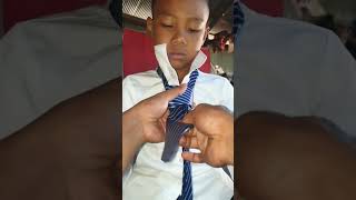 Just a school uniform but beauty of tie is the satisfying view