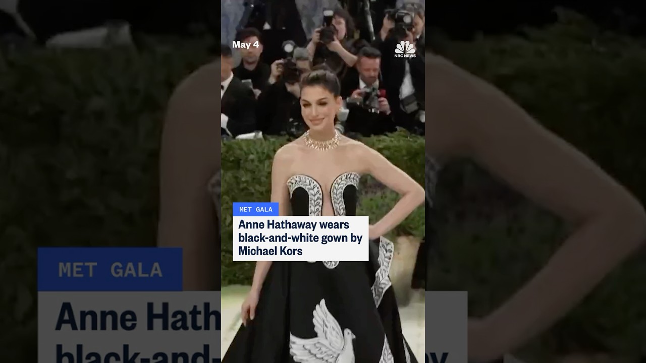 Anne Hathaway wears black-and-white gown by Michael Kors