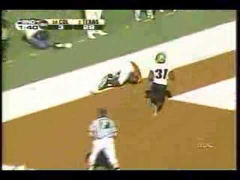 A ref celebrates a touchdown by Limas Sweed of Texas in the 2005 game between UT and Colorado