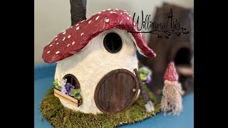 Gnome mushroom house made with a tinfoil, paper towel and glue base.