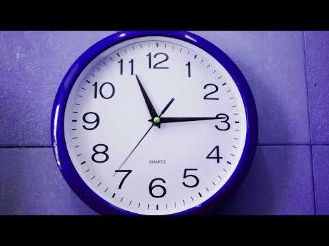 Free Stock footage. Time Lapse of a Clock with time on reverse.