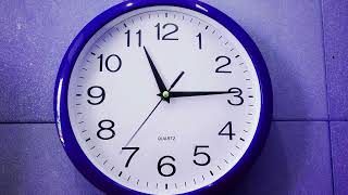 Free Stock footage. Time Lapse of a Clock with time on reverse.