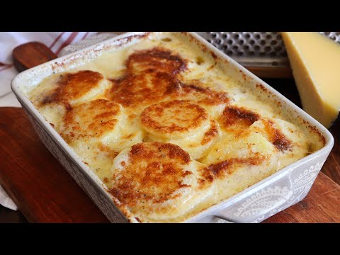 Video: Patatas Al Horno En Crema Con Queso