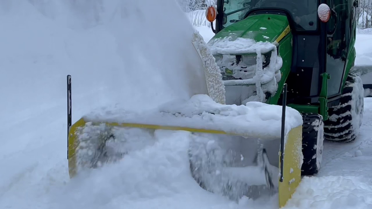 JD 1025R Snow blowing in Alaska