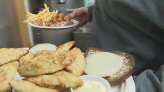 Families and friends gather at Maricque's Bar in Green Bay for the first Fish Fry Friday of the seas