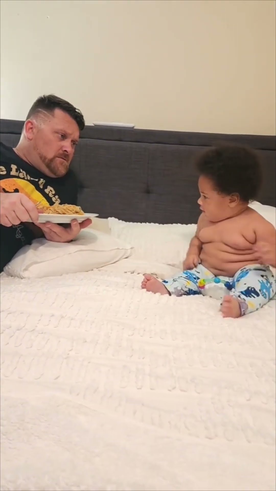 Adorable Baby Triying to Grab Dad's Food