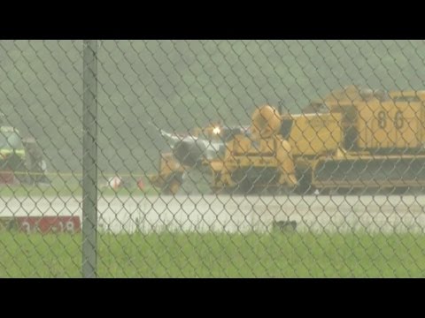Thunderbirds jet on its top at Dayton airport