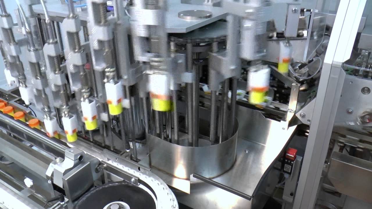 AVC - High speed continuous motion vertical cartoner - YouTube