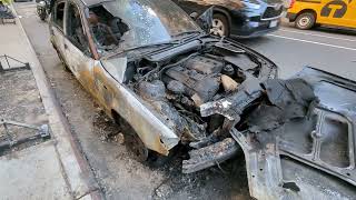 burned out BMW in Manhattan