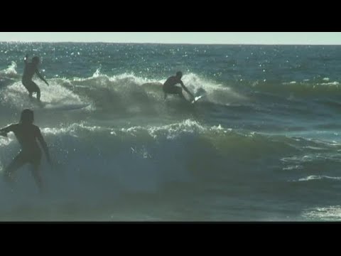 Surfers Taking Advantage Of The Waves At Virginia Beach Surfers Taking Advantage Of The Waves At Virginia Beach
