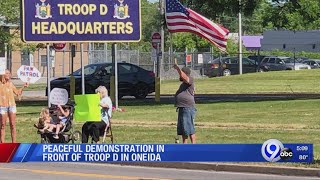 Peaceful demonstration in front of Troop D in Oneida