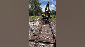 Mud Bucket in action doing emergency repairs to the rail line west of Emerald, Queensland