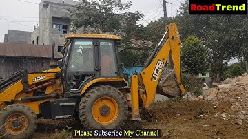 JCB 3DX BACKHOE PUSHING TREE AND CLEANING TREE ROOTS.