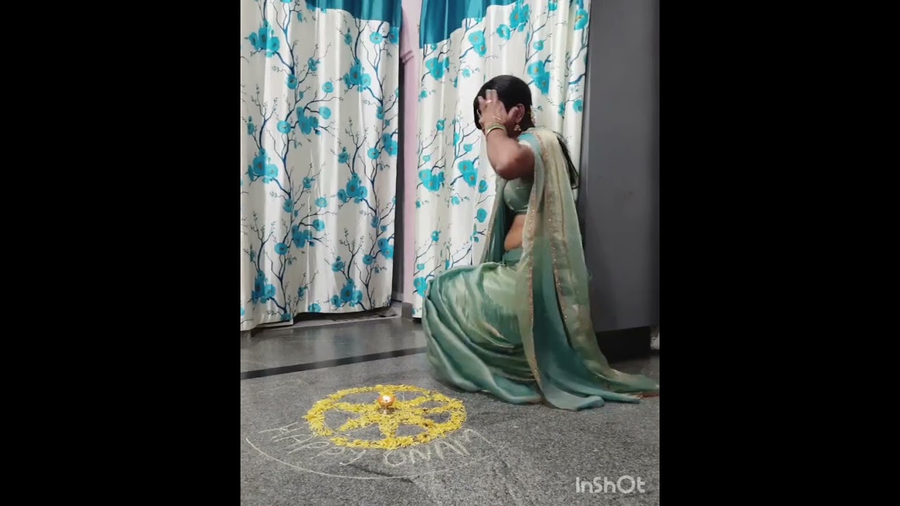 man wearing saree for onam festival