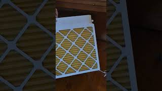 Make a homemade air filter with a 20" box fan, 4-20" air filters, cardoard and duct tape.