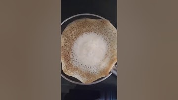 Appam with sweetened coconut milk