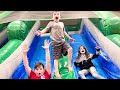 EPIC Playground RACES!! Giant blow up slide