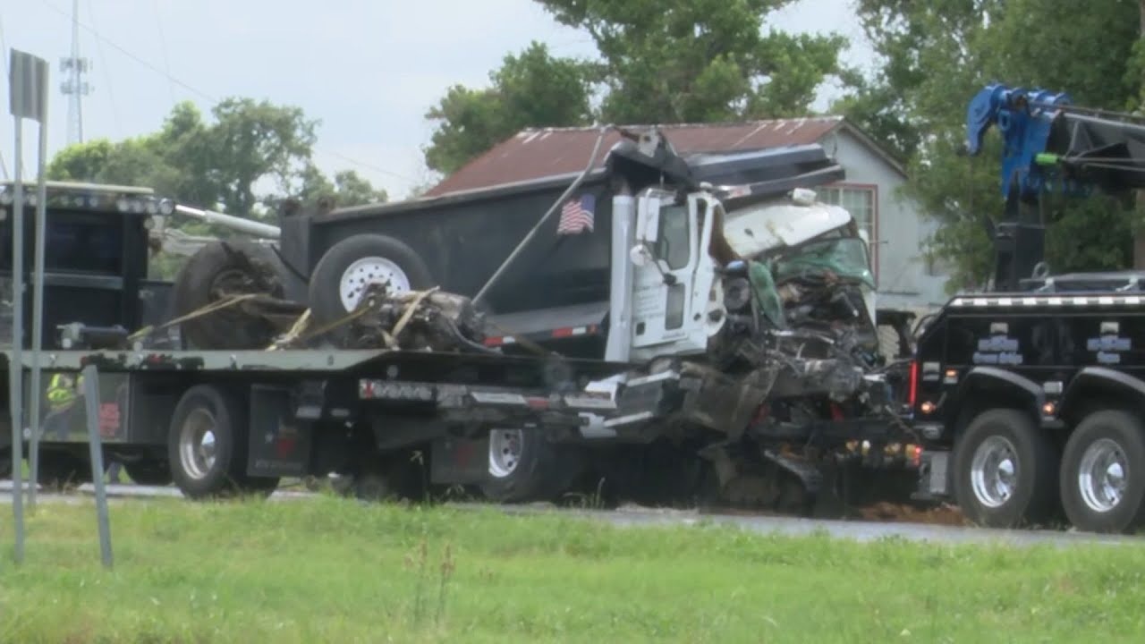Dump truck driver hospitalized after crashing into utility pole on US ...