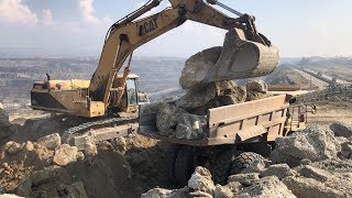 Caterpillar 375 LME Excavator Loading Rocks On Caterpillar Dumpers - Sotiriadis\Labrianidis Mining